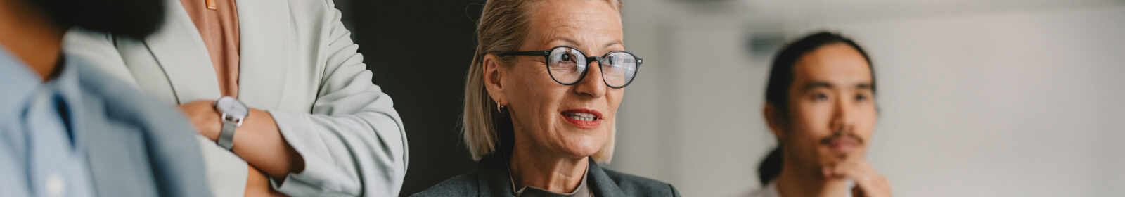 a group of professionals in a meeting